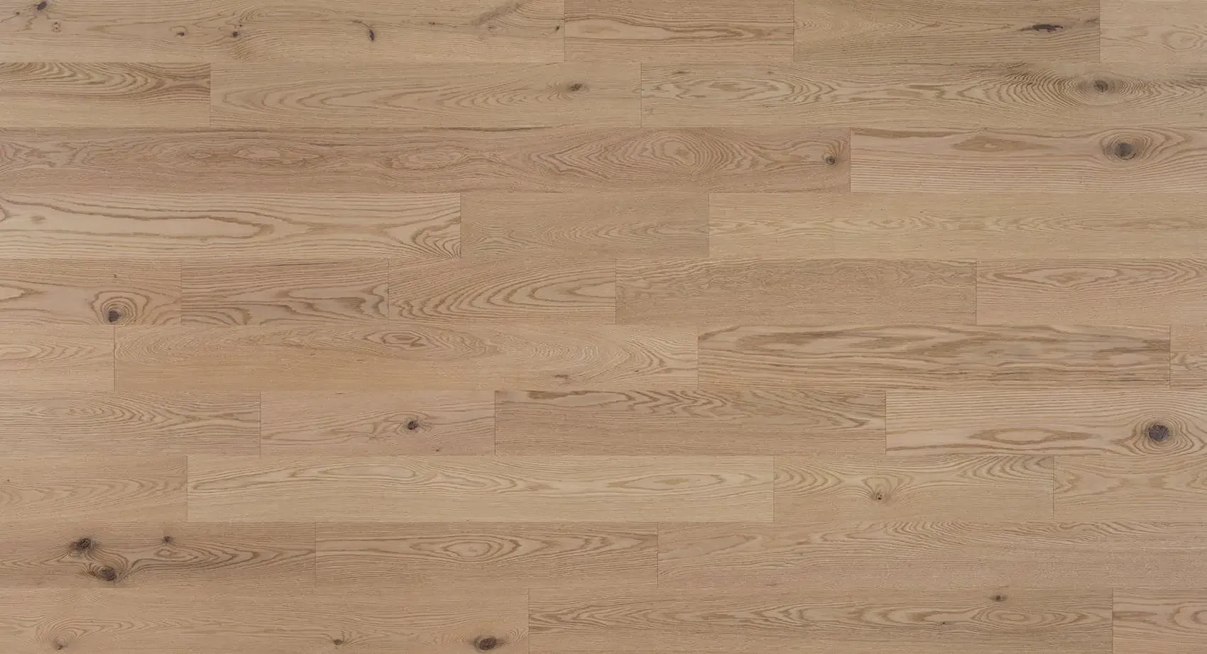 Light brown wood flooring with visible grain and knots.