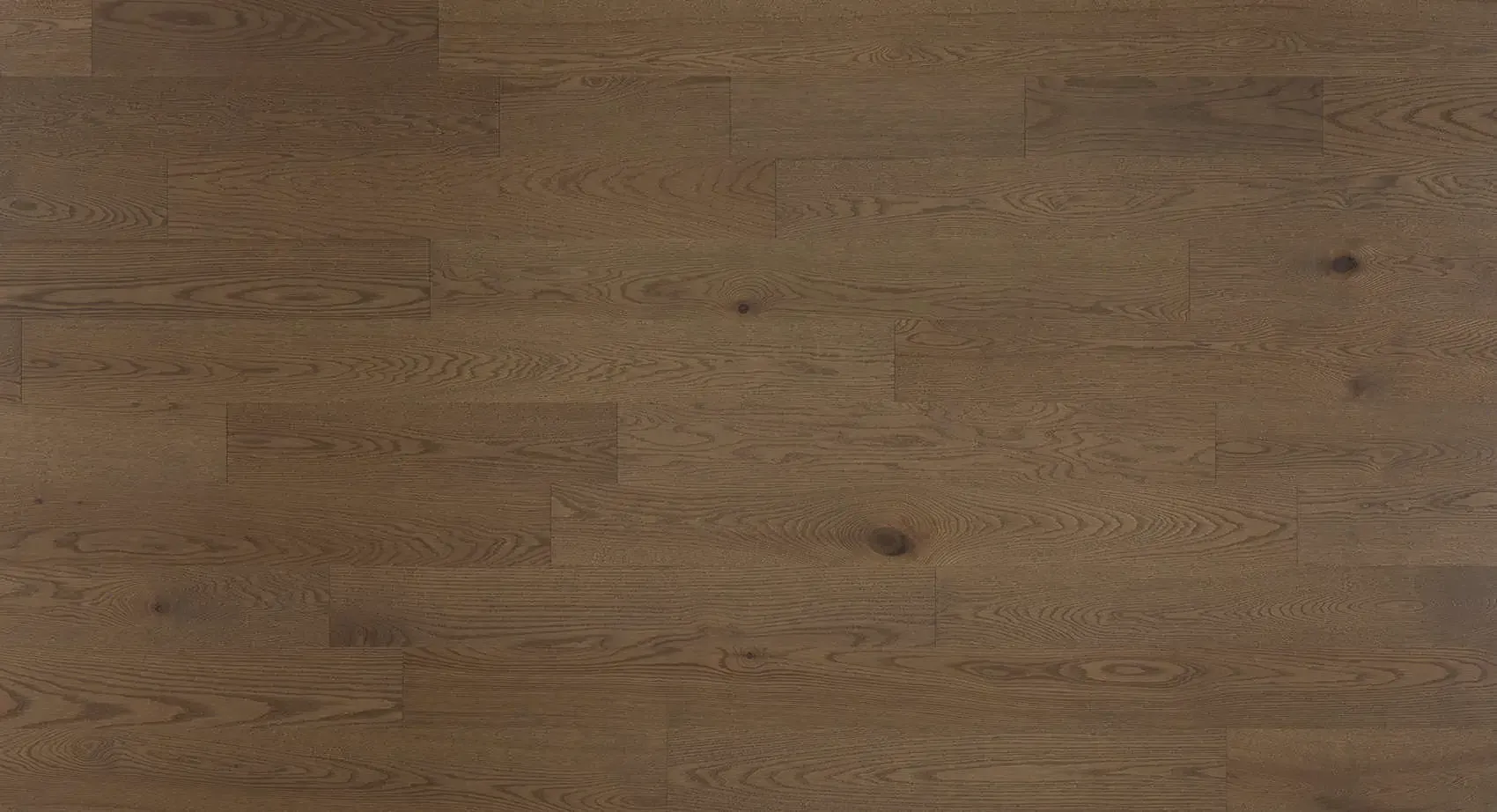 Brown wooden flooring with visible wood grain.