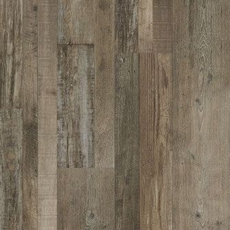 Wood-look flooring with a distressed finish, in shades of brown and gray.
