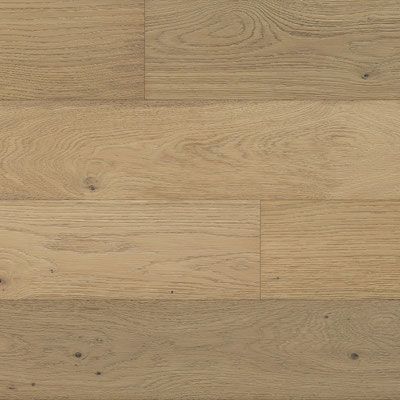 Light oak wood flooring with visible grain and knots.
