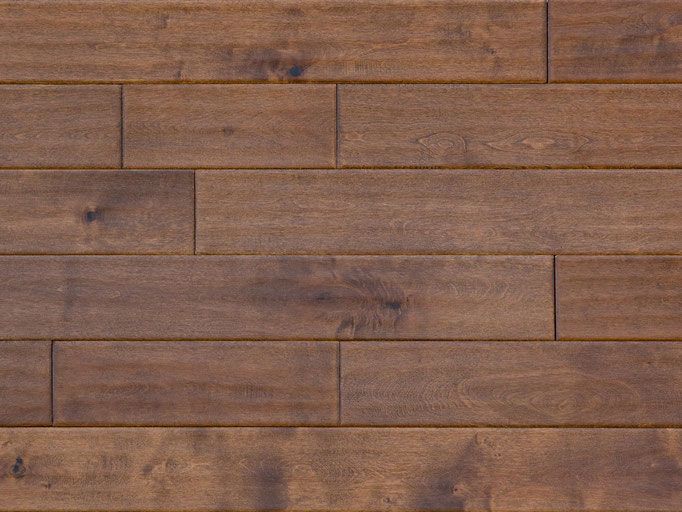 Brown wooden planks arranged horizontally, with varying grain and subtle color variations.