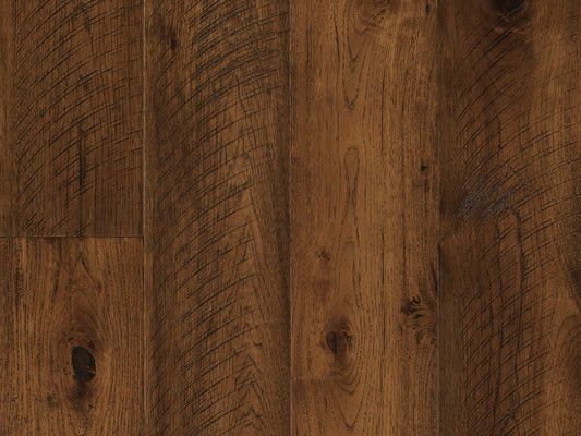 Dark brown wood flooring with visible grain and knots.