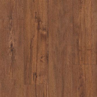 Close-up of hardwood floor. Brown, wood grain pattern with vertical planks.