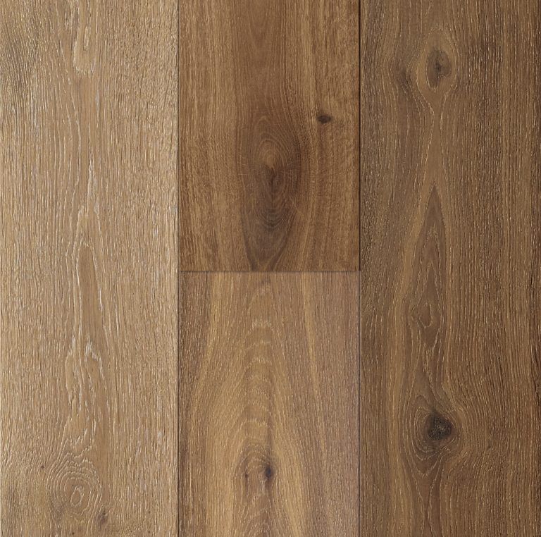Close-up of wood flooring planks in varying shades of brown, creating a textured surface.