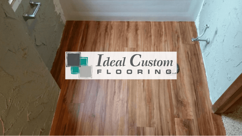 Wood-look flooring installed in a hallway, with the 