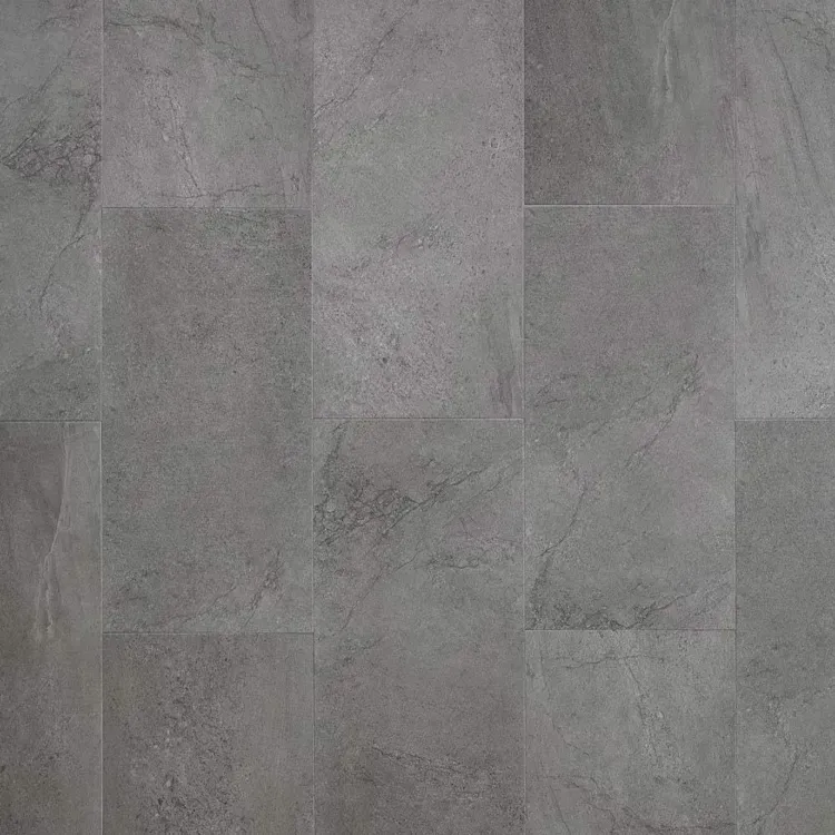 Gray stone-look tile flooring, with rectangular shapes and various shades of gray.