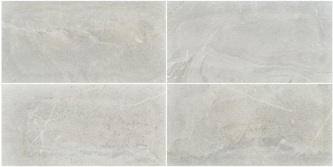 Four light grey rectangular tiles arranged in a 2x2 grid.