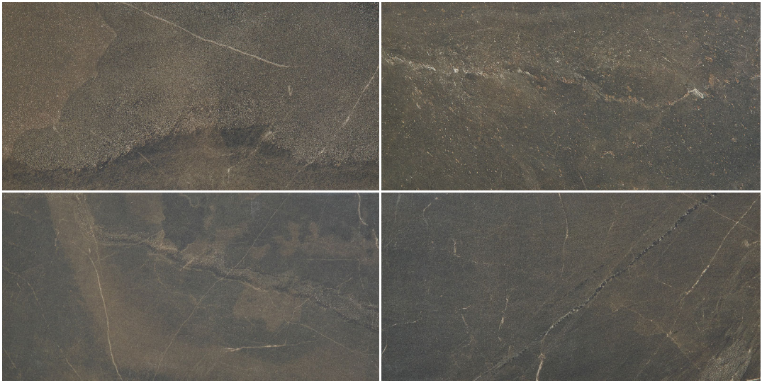 Four dark, textured tiles, gray-brown color, with subtle veining, arranged in a square.