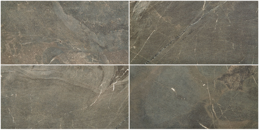Four stone-like tiles arranged in a 2x2 grid; dark gray with subtle veining and texture.