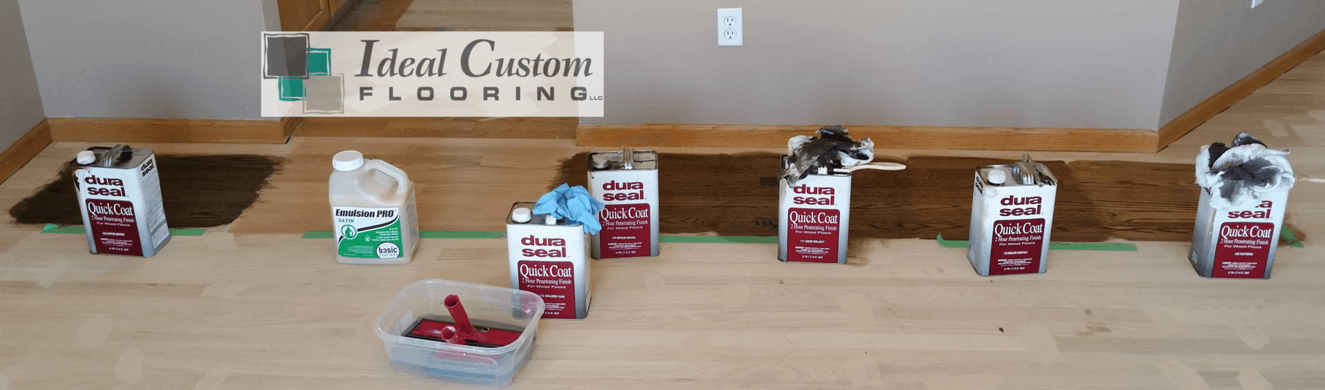 A room with flooring supplies, paint cans and cleaning products spread out.