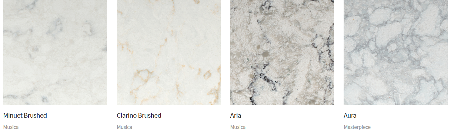 Four countertop samples in white and gray with veining.