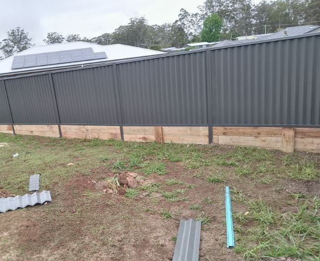 A Charcoal Corrugated Metal Fence — A Betta Fence 'N' Yard In Thrumster, NSW