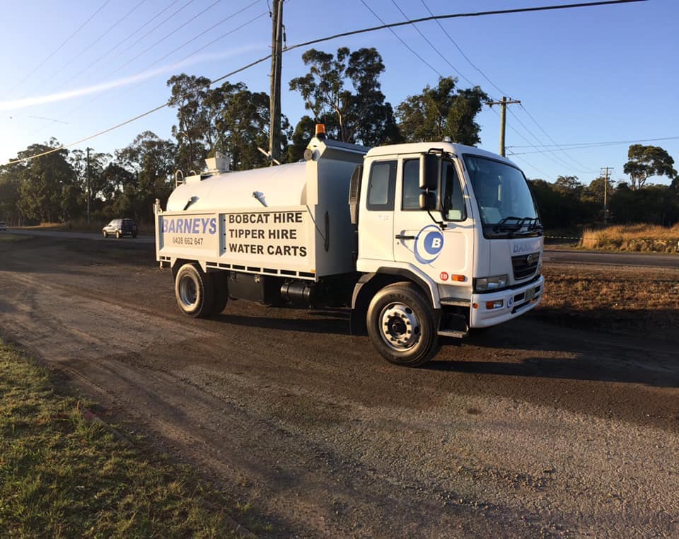 Water Truck On The Road — Water Cartage in Morisset, NSW
