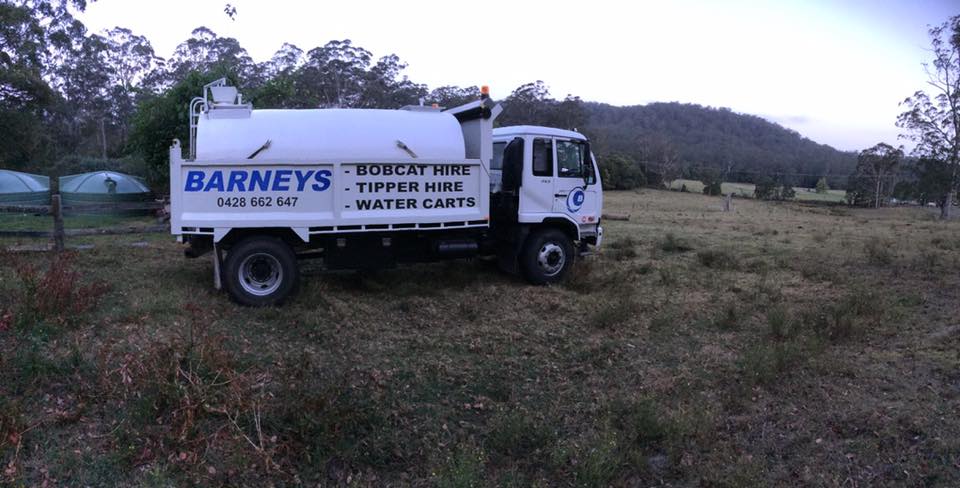 Water Truck On A Field— Water Cartage in Morisset, NSW