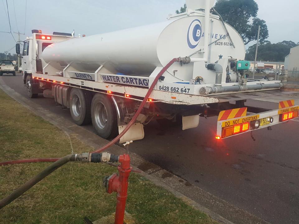 Truck Filling Out Water — Water Cartage in Morisset, NSW