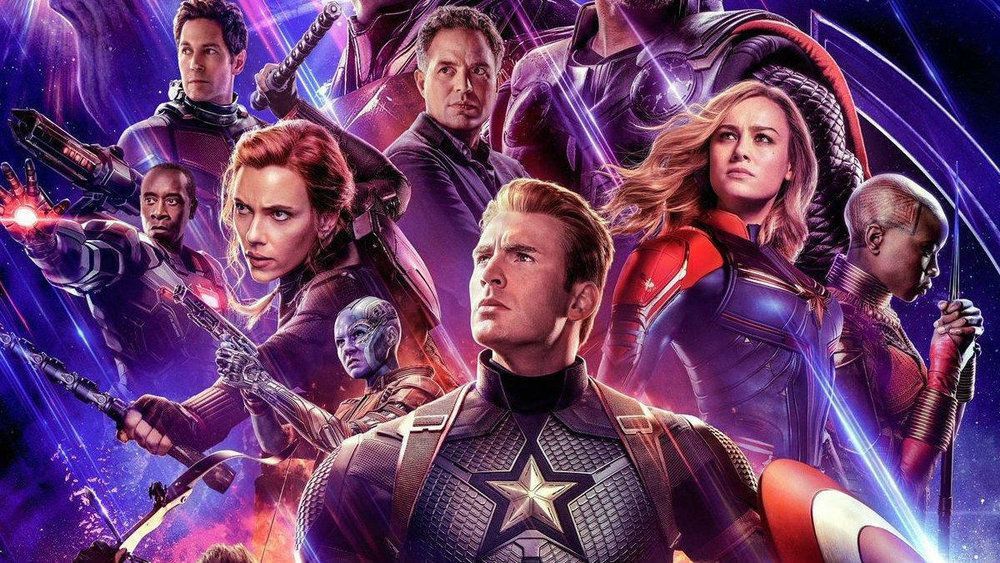 A group of avengers standing next to each other on a poster.