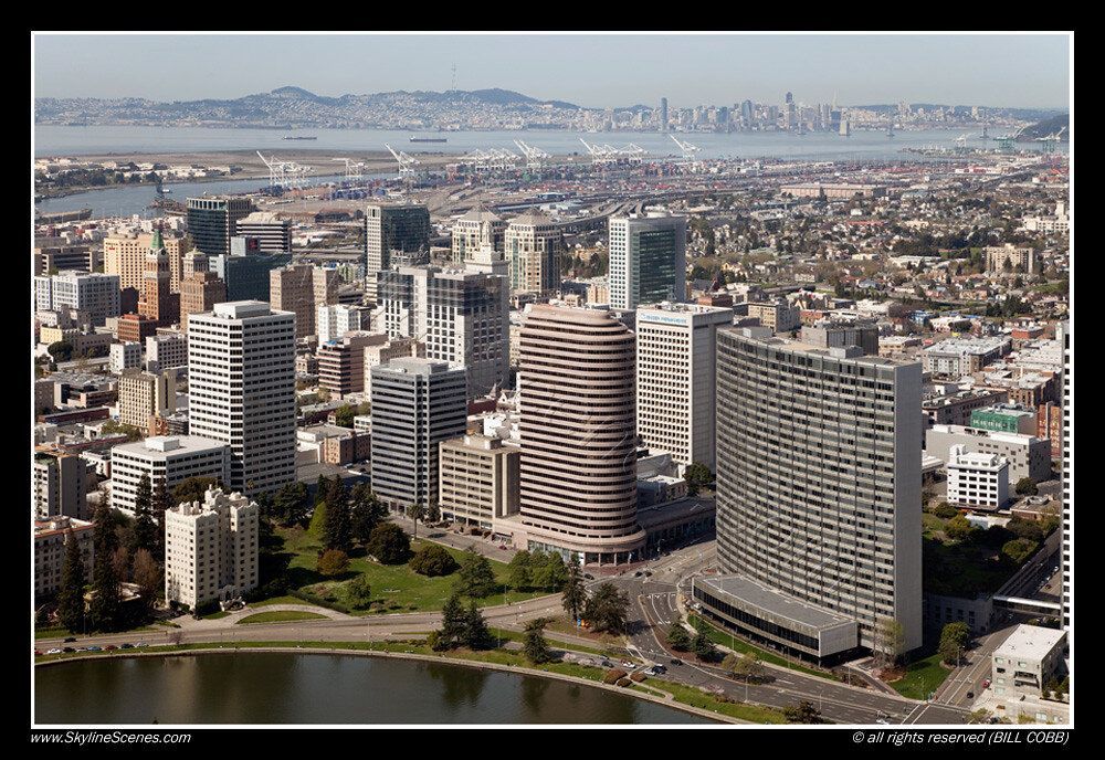 An aerial view of a city with a lake in the middle