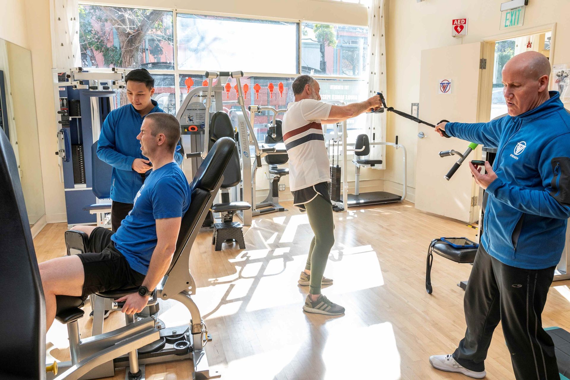 Clients working out at TNT Strength in Oakland