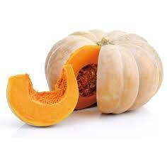 A whole pumpkin and a slice of pumpkin on a white background.