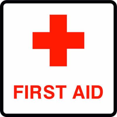 A first aid sign with a red cross on a white background.