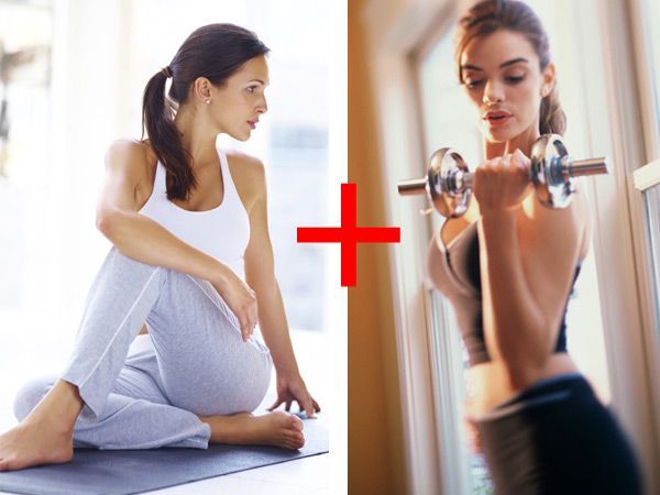 A woman sitting on a yoga mat next to a woman lifting dumbbells