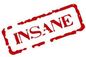 A red stamp that says insane on a white background