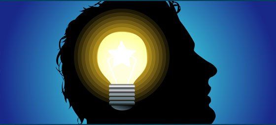 A silhouette of a man with a light bulb in his head