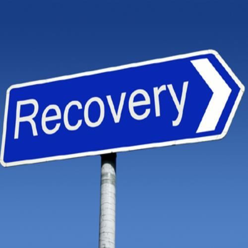 A blue street sign that says recovery on it