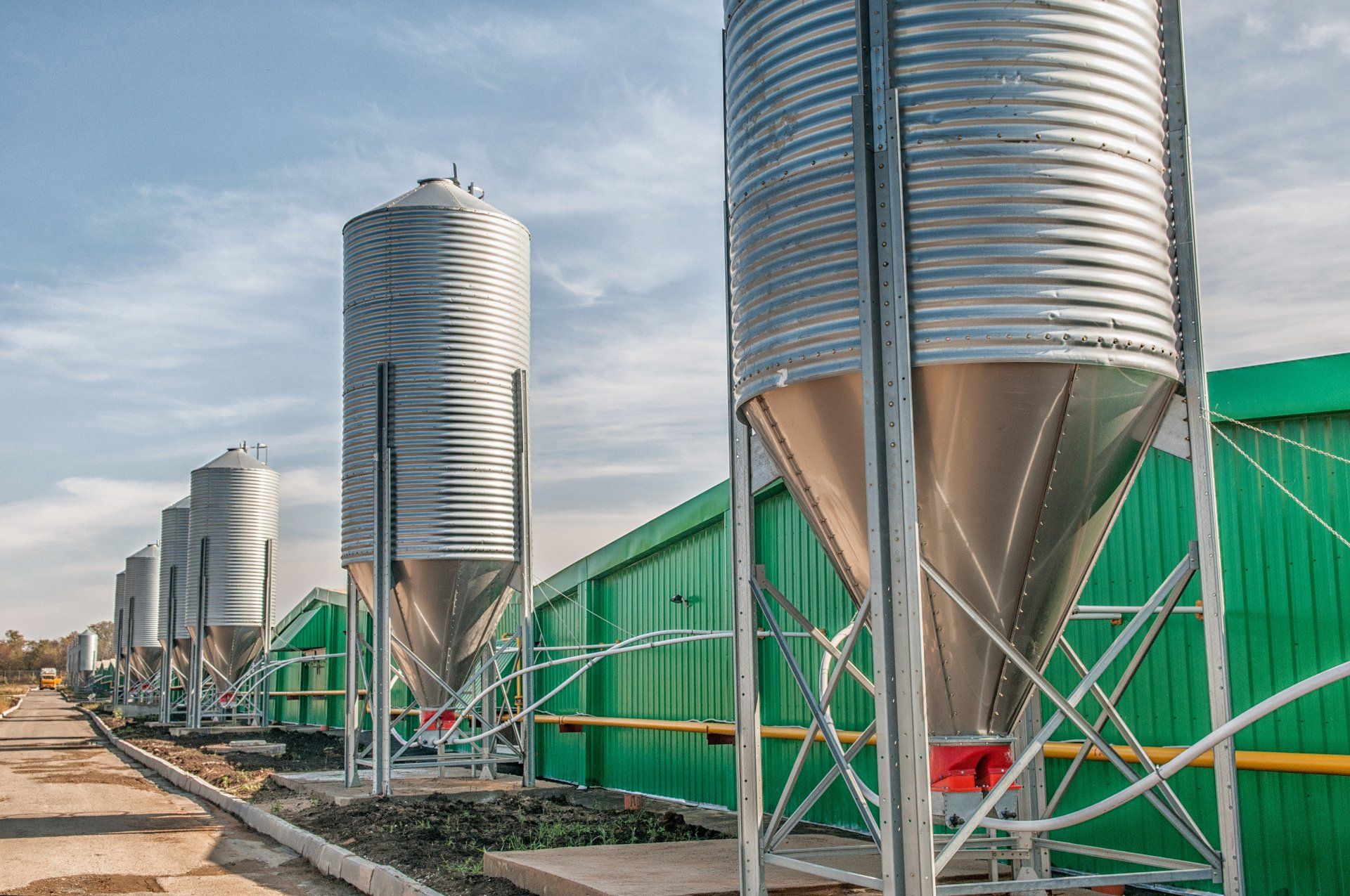 Custom farm & rural sheds - silo outside of storage shed