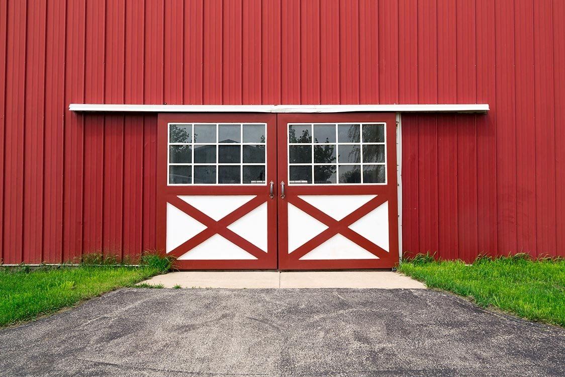 custom made steel barn sheds  - Front of a red Commercial Shed