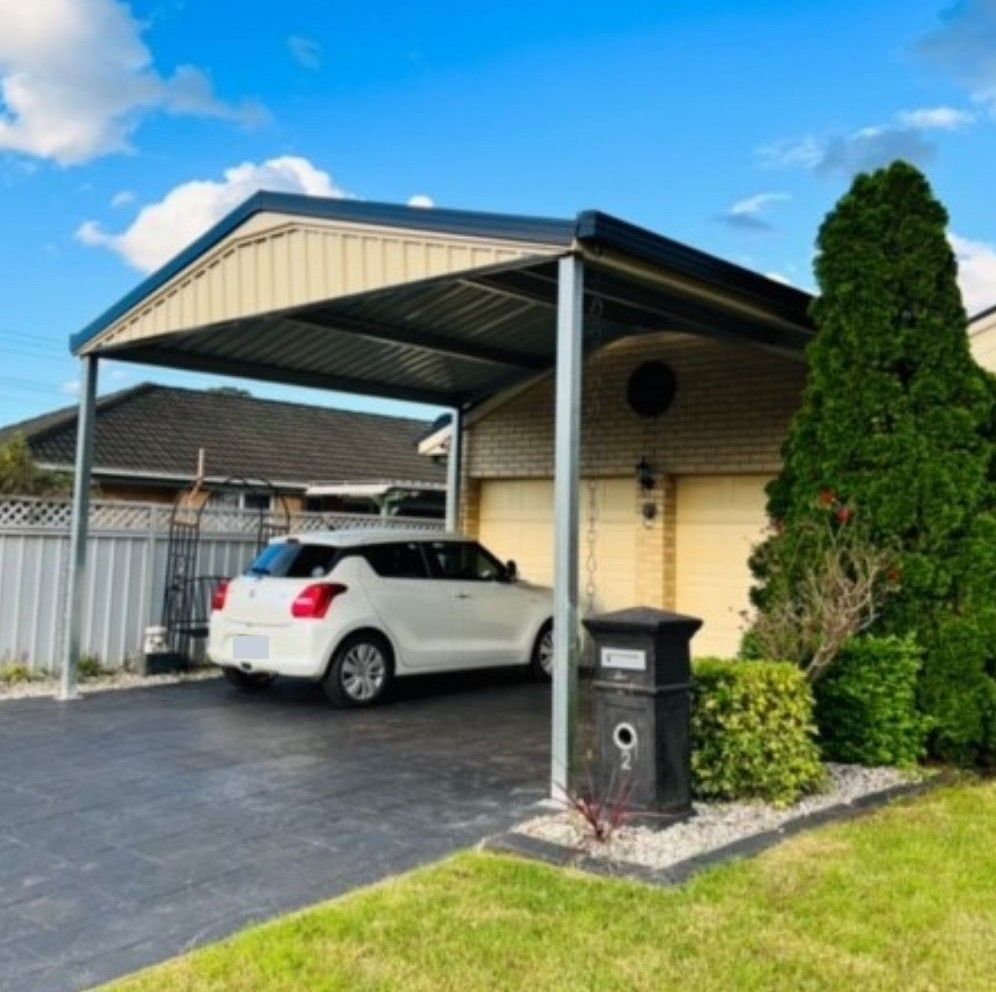 Flat Roof, Gable Roof or Hip Roof Carports: Which is Best for You? Photo of a Gable Carport