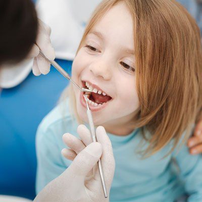 Children — Kid Having Dental Treatment in Coon Rapids, Minnesota