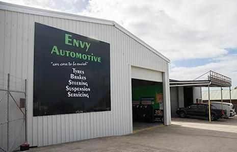 A Large Sign on The Side of A Building — Envy Automotive in Gorokan, NSW
