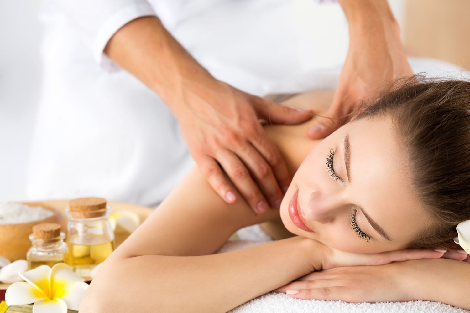 A woman is getting a massage at a spa.