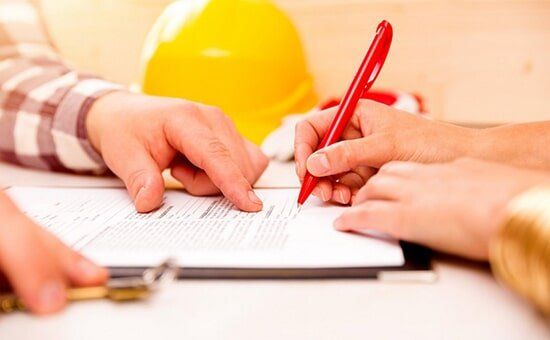 Signing Construction Contract With Contractor — Signing A Paper in Nashville, TN