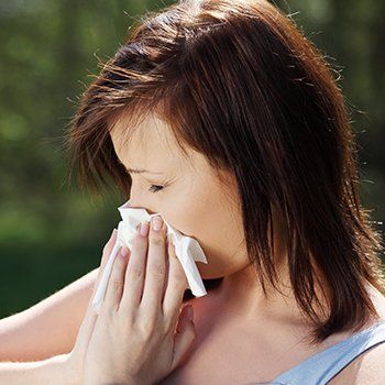 Woman Blowing Her Nose — Bluefield, VA — Allergy & Asthma Center of Bluefield
