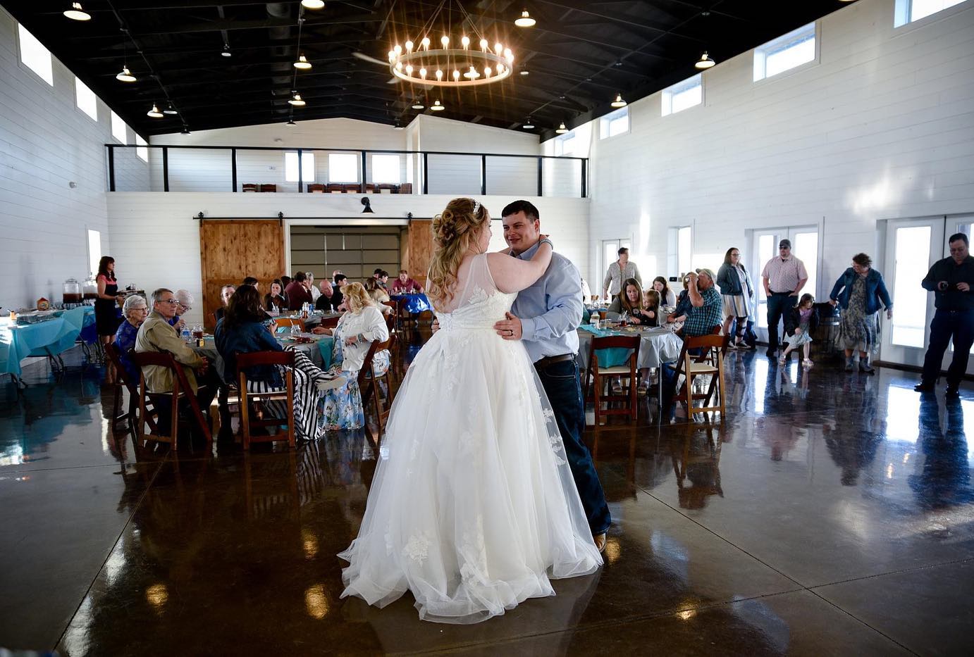 bride and groom dancing