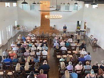 wedding guests seated