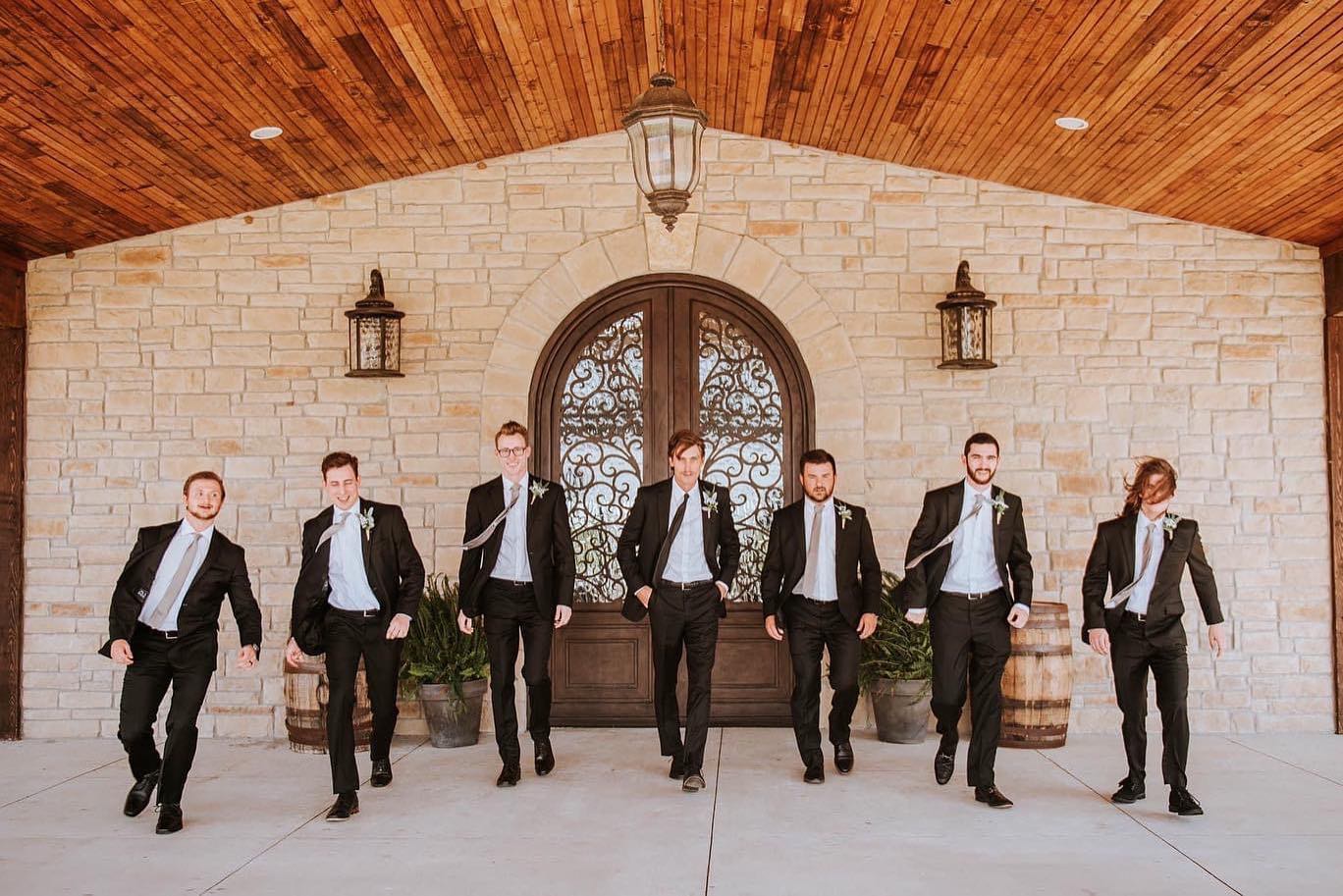 groomsmen in front of door