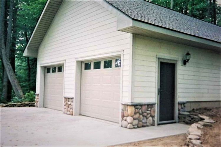 White House with Two Garage Door — Hendersonville, NC — Tripps Renovations LLC