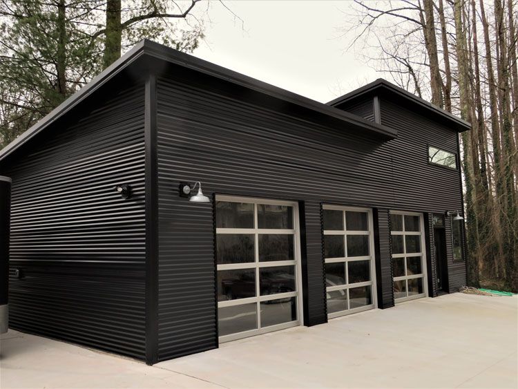 Black House with Three Garage Door — Hendersonville, NC — Tripps Renovations LLC
