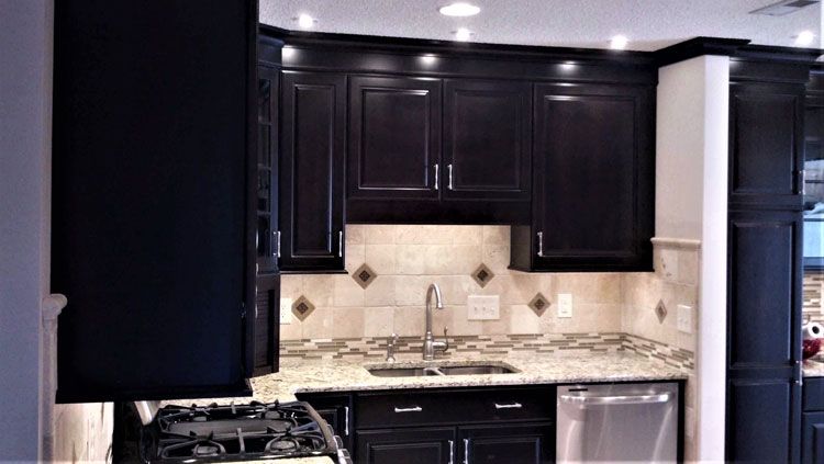 Kitchen with Black Cabinet — Hendersonville, NC — Tripps Renovations LLC