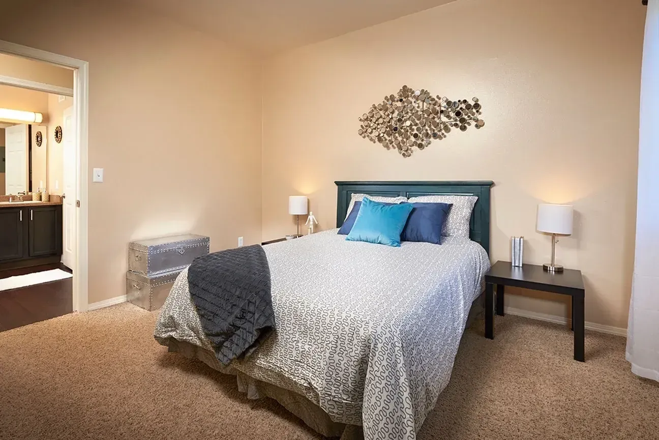 Bedroom with blue pillow