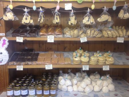 Famous Yorkshire curd tarts and various other baked goods on shelfs in our bakery