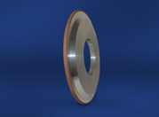 Un anillo de metal con un agujero en el medio sobre una superficie azul.