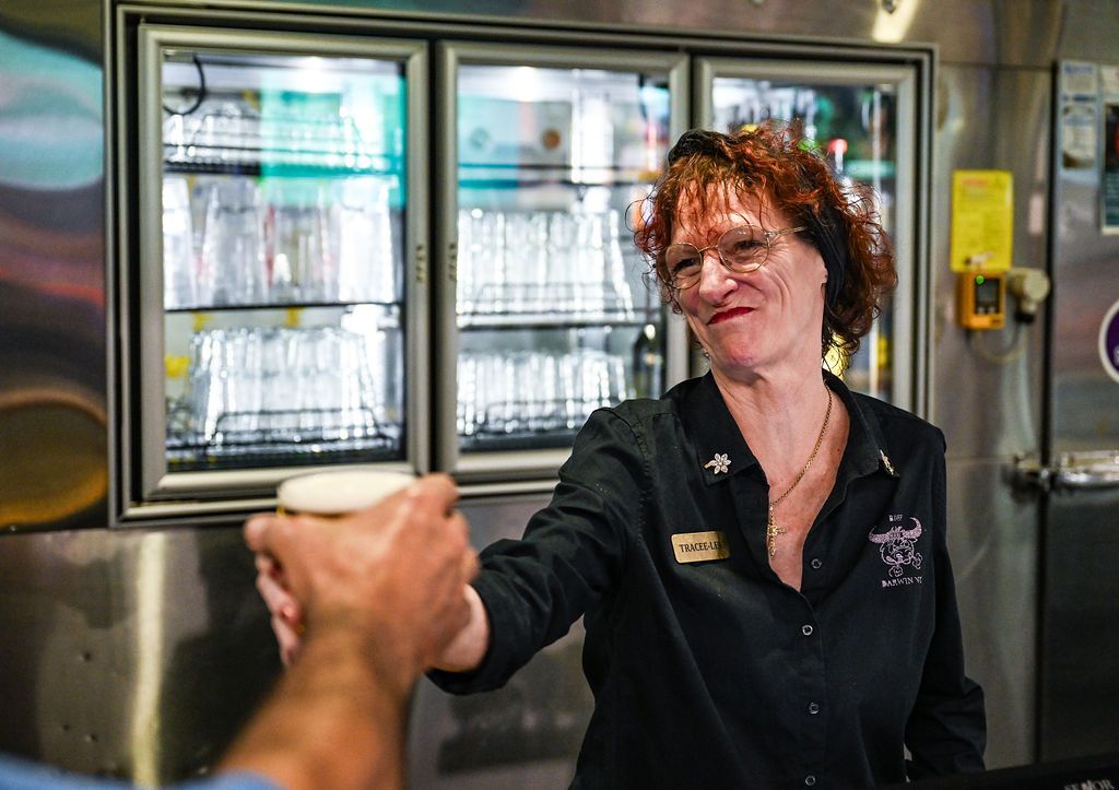 Staff Serving a Beer — Pub in Stuart Park, NT