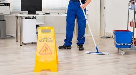 Janitorial Cleaning — Janitor Cleaning Using Mop in Fayetteville, NC