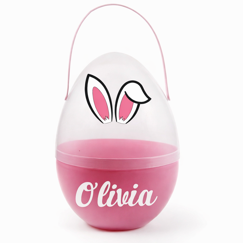 Een roze en transparante paaseierdoos met handvat, waarop 