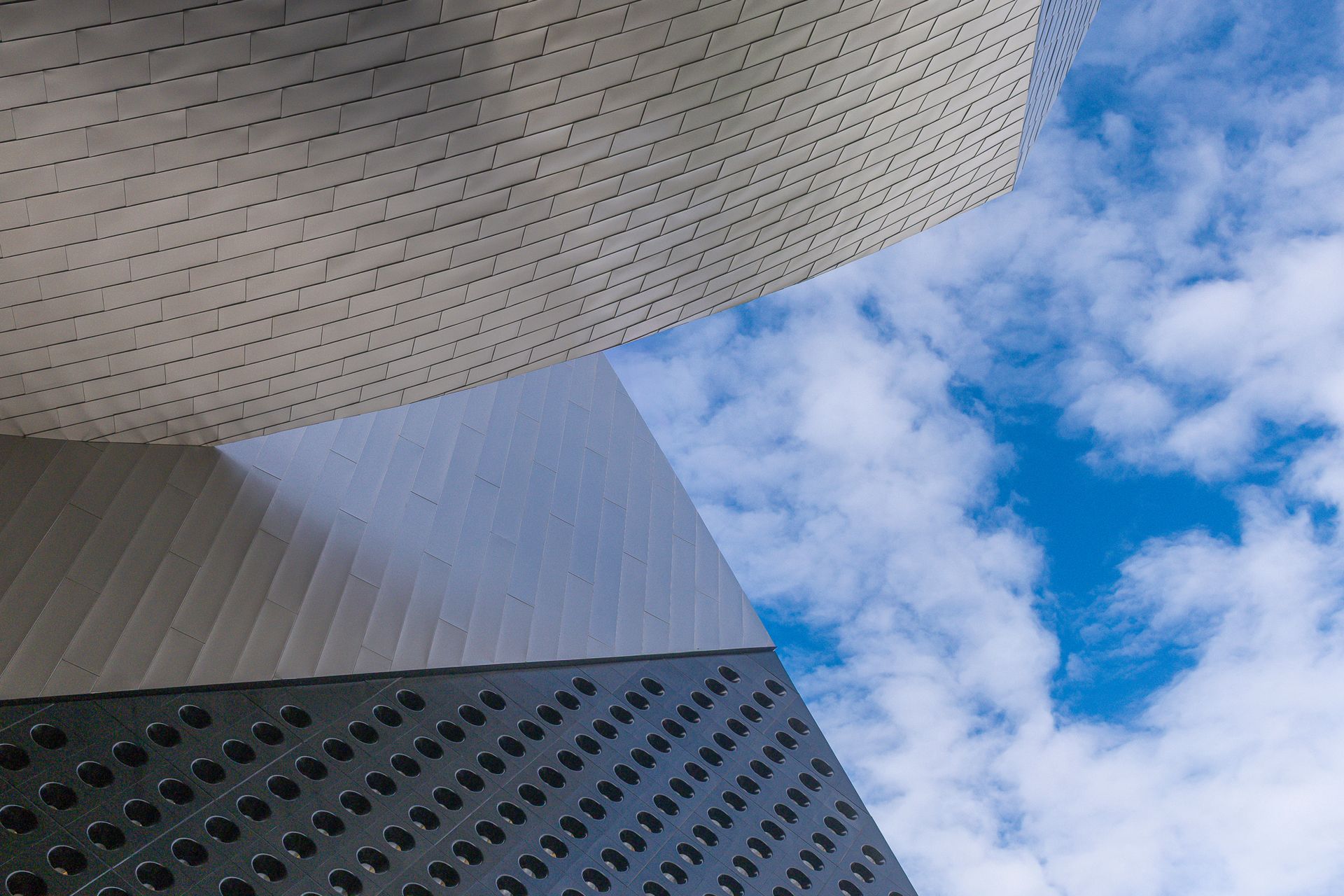 Modern geometric building architecture with deep shadows and clear blue sky in Las Vegas, Nevada.
