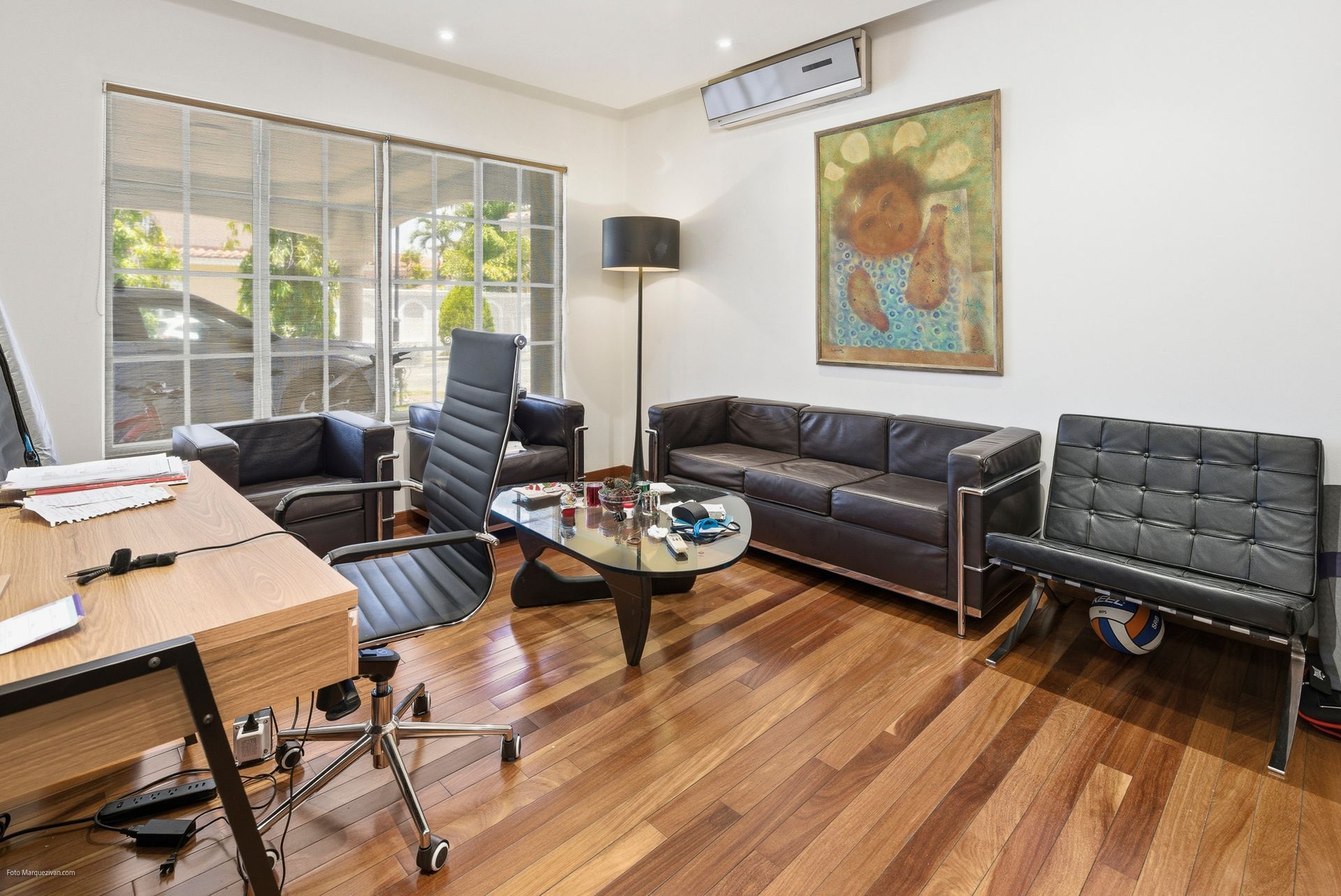 Costa del Este living room as captured on-site before digital declutter, Panama luxury real estate photography.
